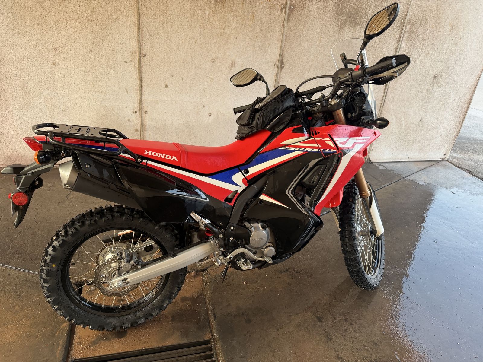 Honda CRF250L Rally Motorcycle - Red, Black, and Blue Dual Sport