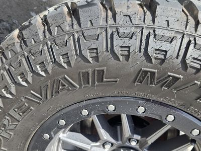 SET OF 35X12.50R18 MUD TIRES