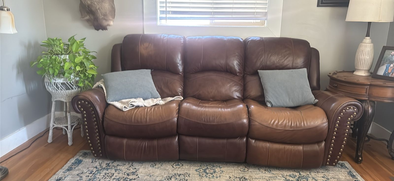 Brown Leather Reclining Sofa with Nailhead Trim