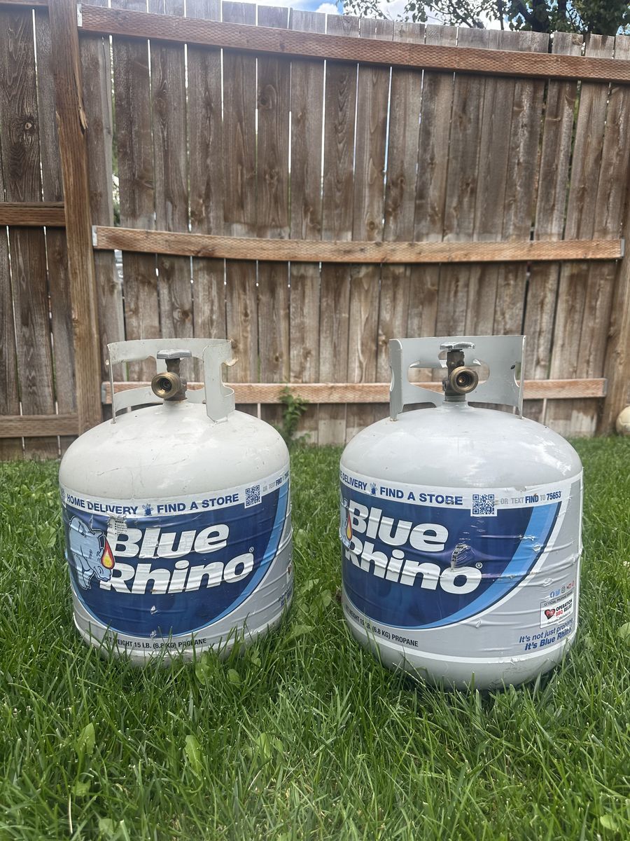 Two Blue Rhino Propane Tanks