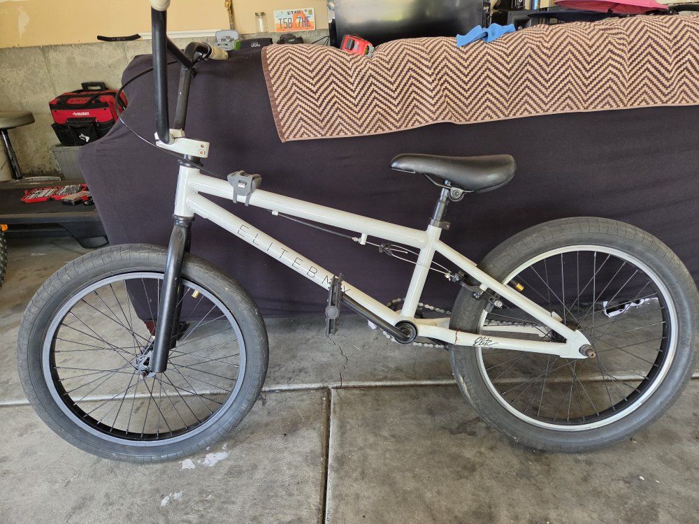 Elite BMX Freestyle Bike - Used White 20-inch Wheels one flat