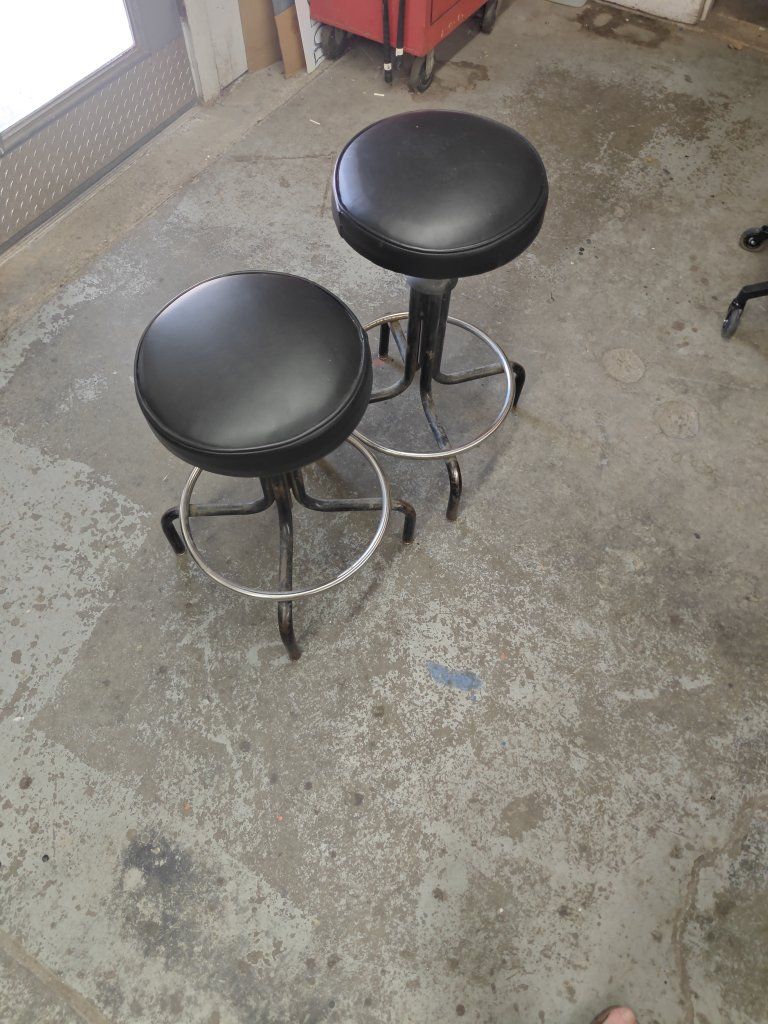 Pair of Adjustable Height Black Swivel Bar Stools - Industrial Style with Footrest