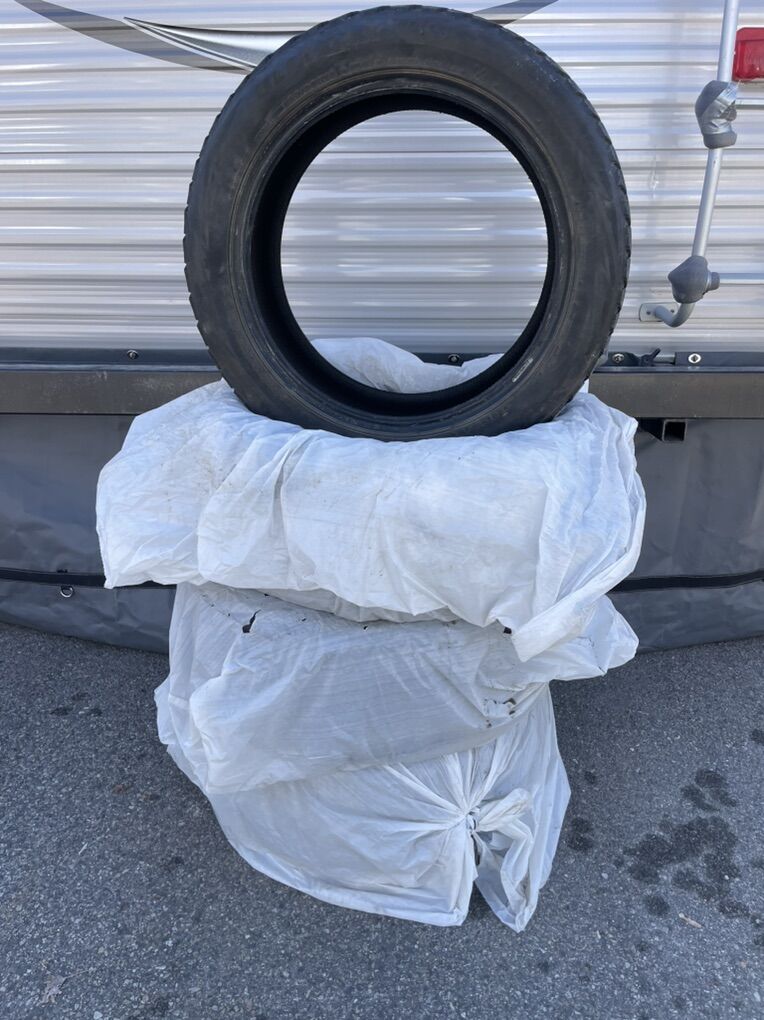 4 - 235/50R18 Blizzak Tires