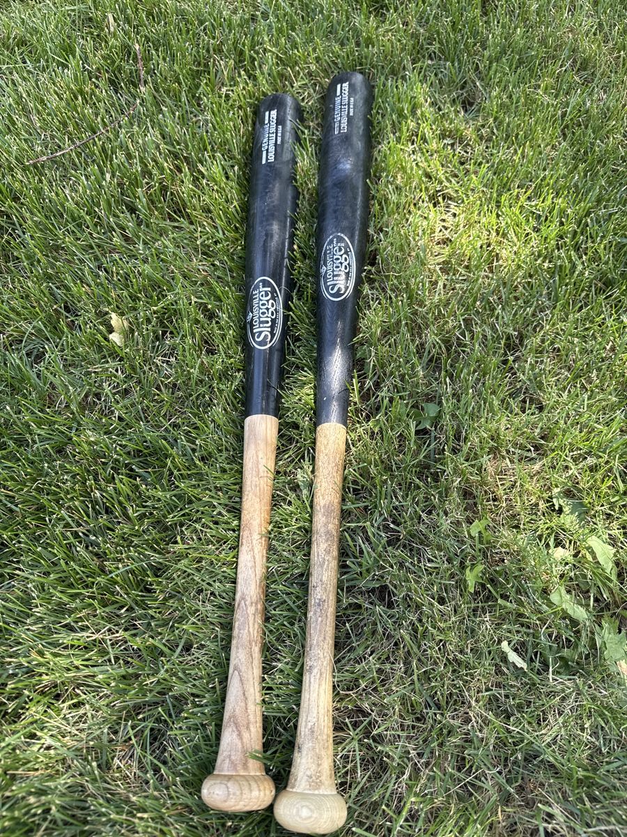 2 Louisville slugger wood baseball bats