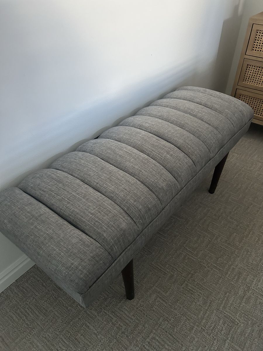 Modern Grey Upholstered Channel-Tufted Storage Bench with Dark Wooden Legs