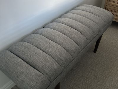 Modern Grey Upholstered Channel-Tufted Storage Bench with Dark Wooden Legs