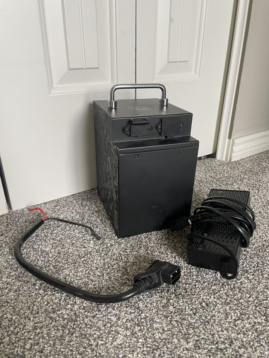Tuttio Battery/ Charger
