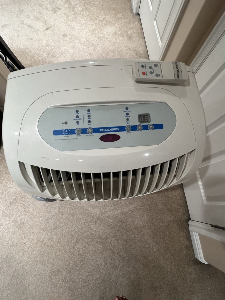 This is a Fedders/Maytag 9,000 BTU portable air conditioner, model M6P09S2A*B