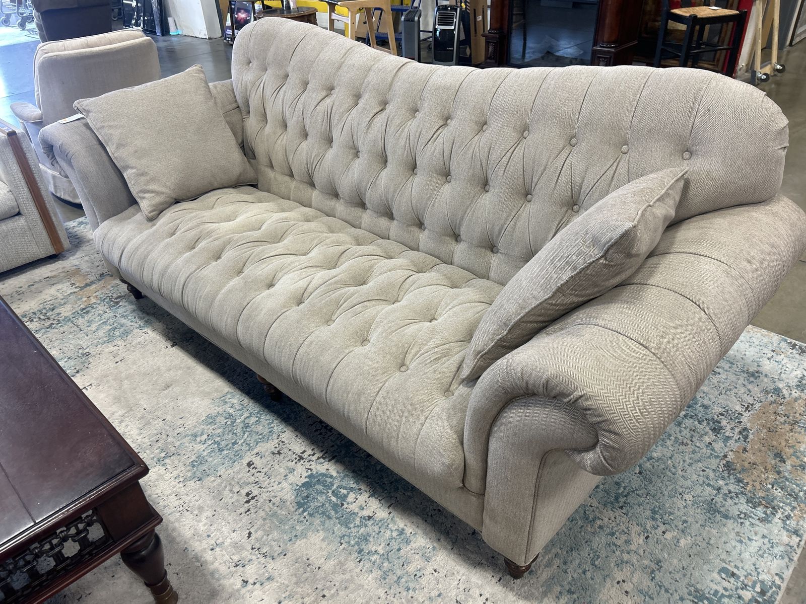 vintage high-back curved Chesterfield conversation sofa.