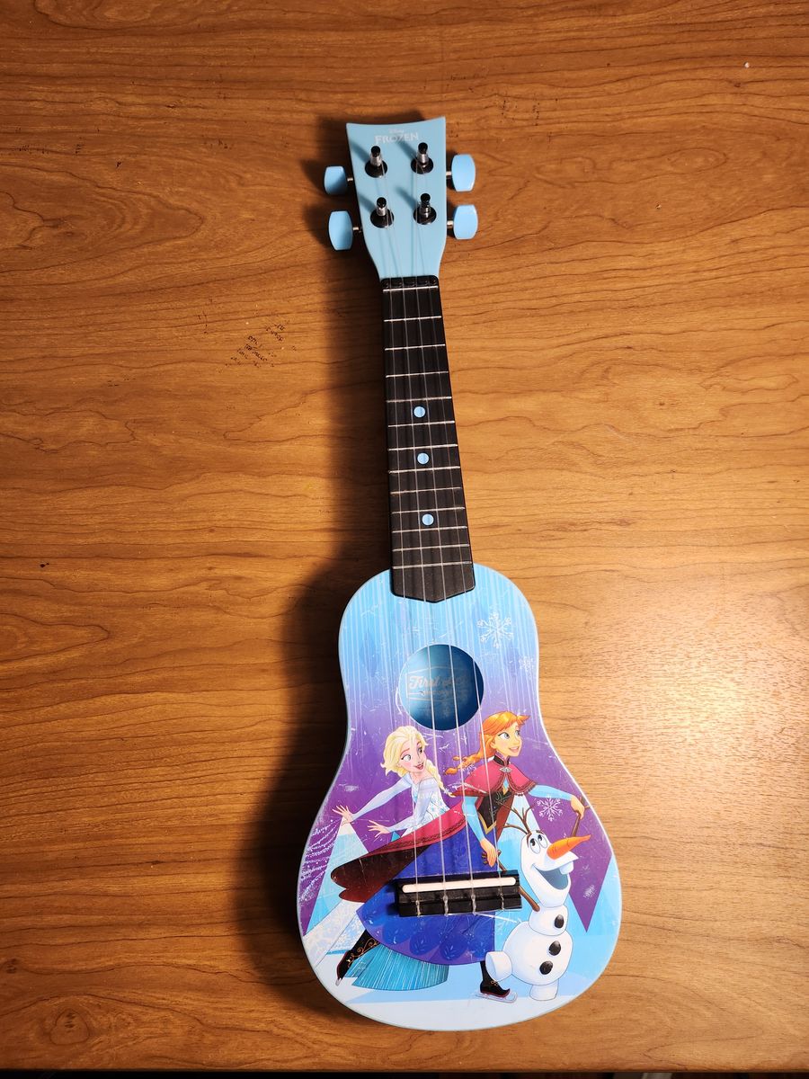 Disney Frozen Ukulele uke made by First Act.  Plays and sounds great.