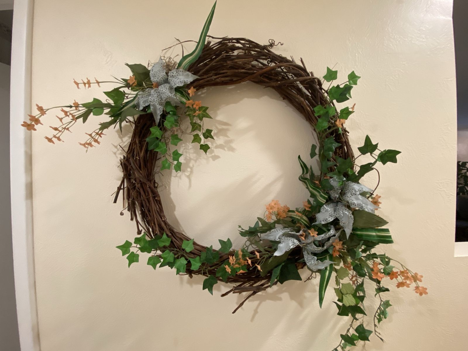 Decorative Grapevine Wreath with Artificial Floral Accents