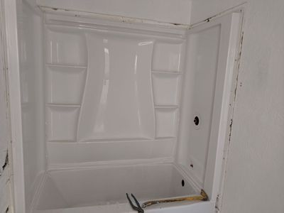 Bath surround and tub