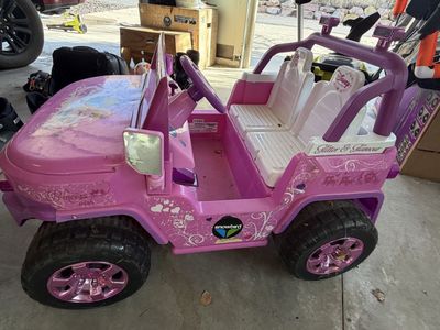 Pink Fisher-Price Power Wheels ride-on