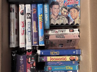 A Box of various movies in DVD and VHS