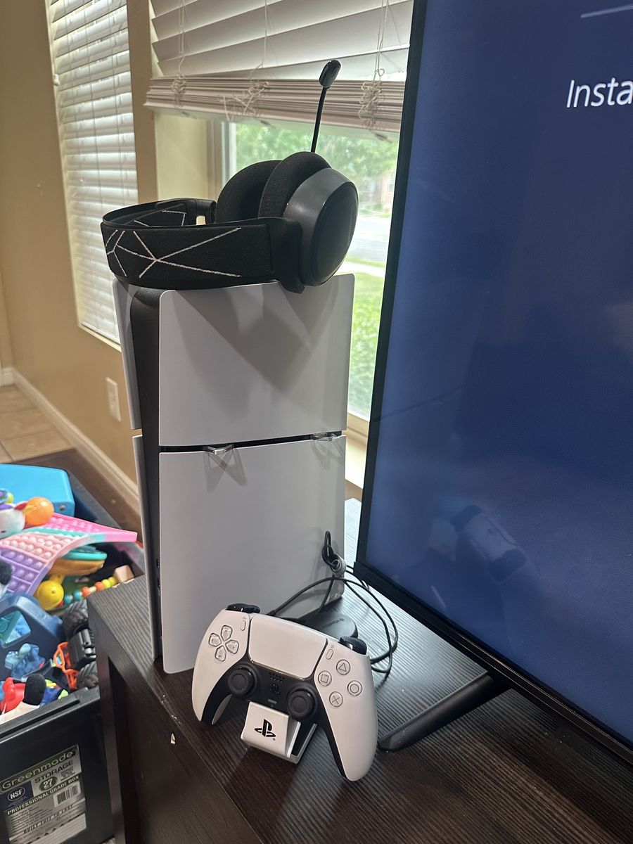 LIKE NEW PlayStation 5 Slim Digital 1TB with headset charger and arc raiders installed
