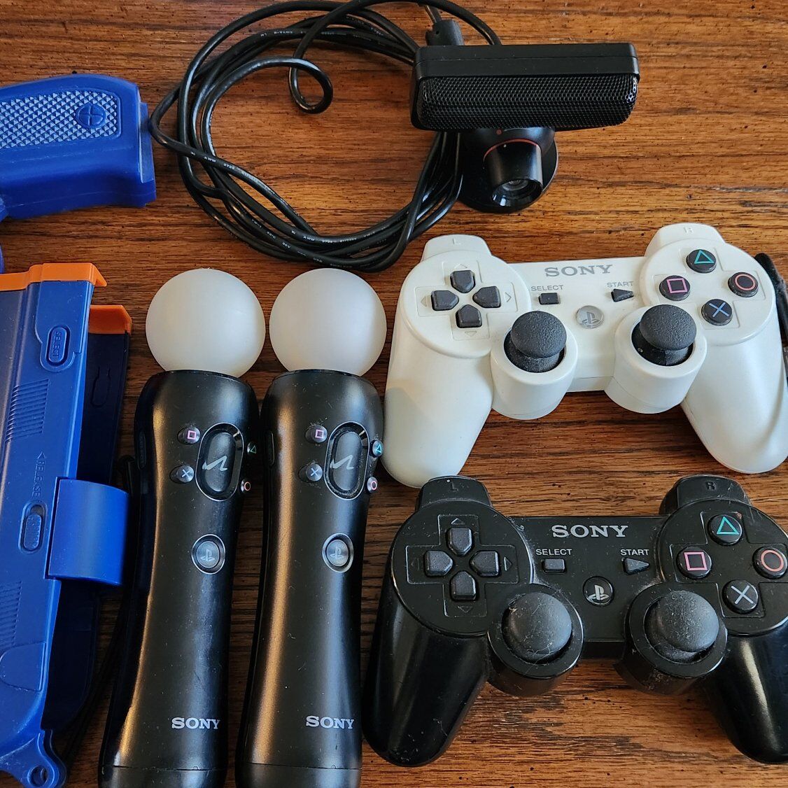 PS3 wireless and motion controllers, camera, games