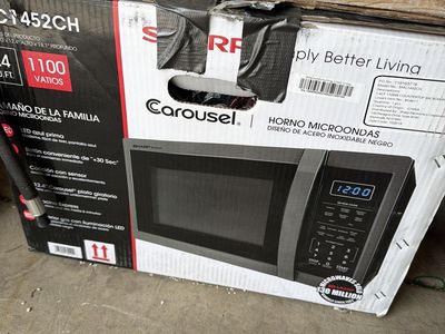 Sharp Microwave 1.4 cu.ft. Like new.