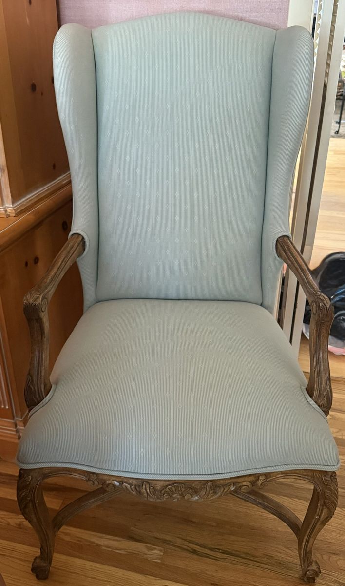 Antique upholstered green chair