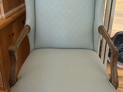 Antique upholstered green chair