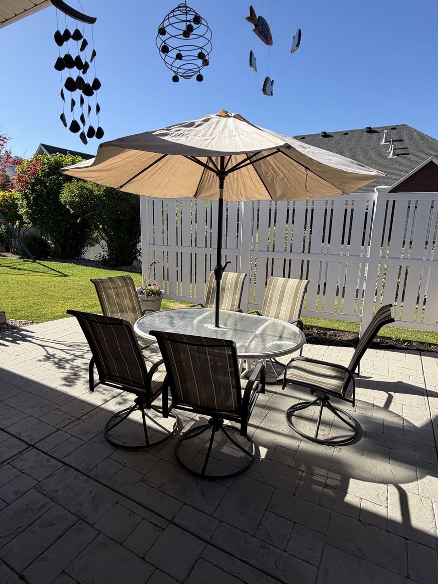 Patio Table, Chairs, Umbrella and stand.