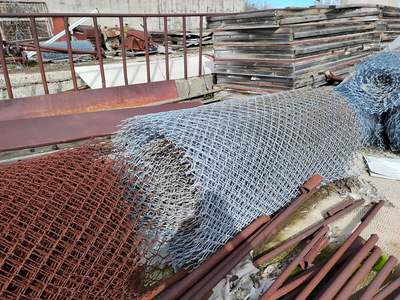 Wire roll fencing and chain link fence