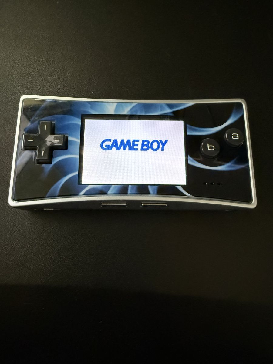 Nintendo Game Boy Micro Silver Handheld Console with Charger & Blue Swirl Faceplate
