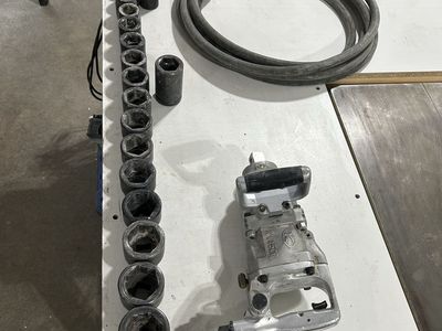 1” impact wrench with full set of sockets and hose