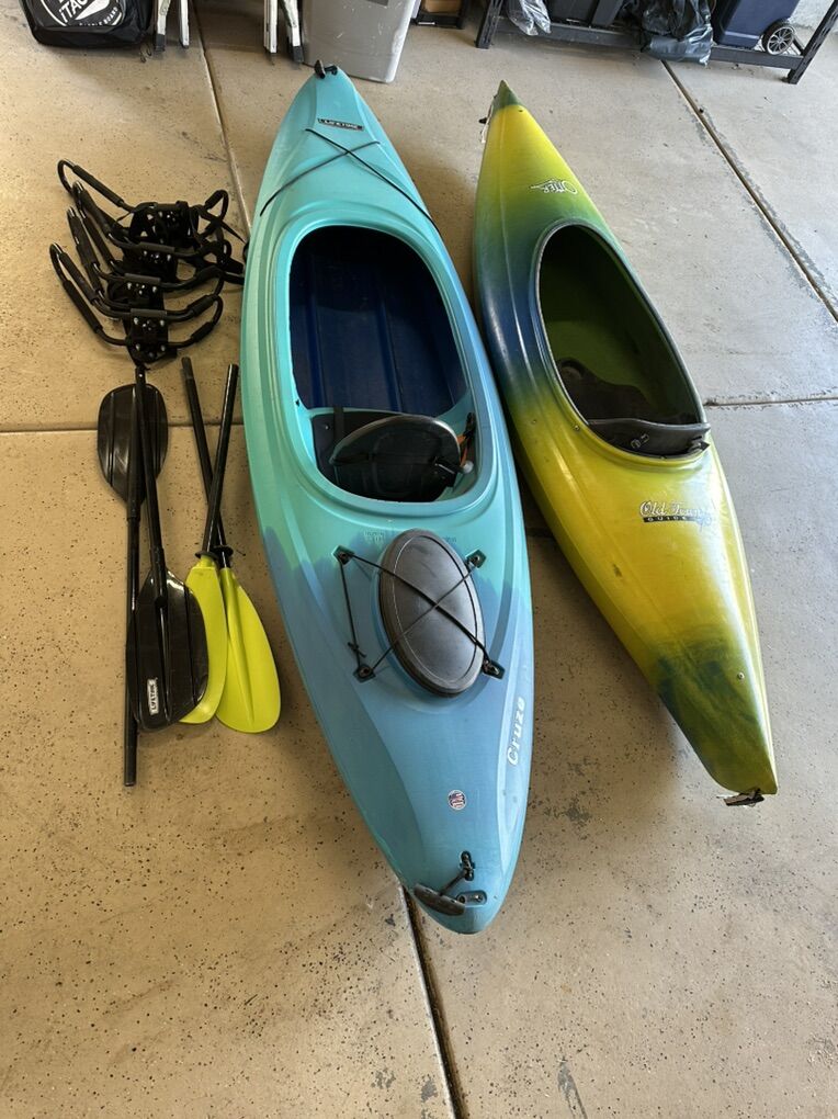 2 kayaks Plus Roof Racks And Paddles