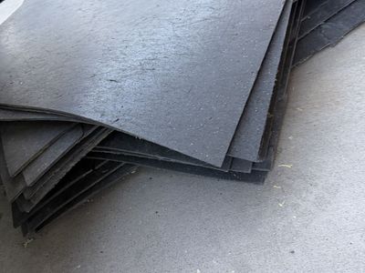 Assorted Used Rubber Mat Pieces - primarily Black, and Blue & Red scraps, Various Shapes & Sizes.