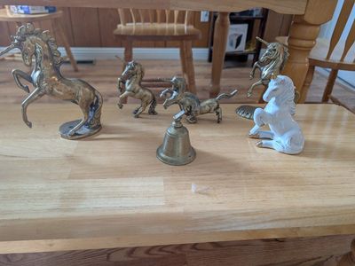 Brass unicorn figurines and vases
