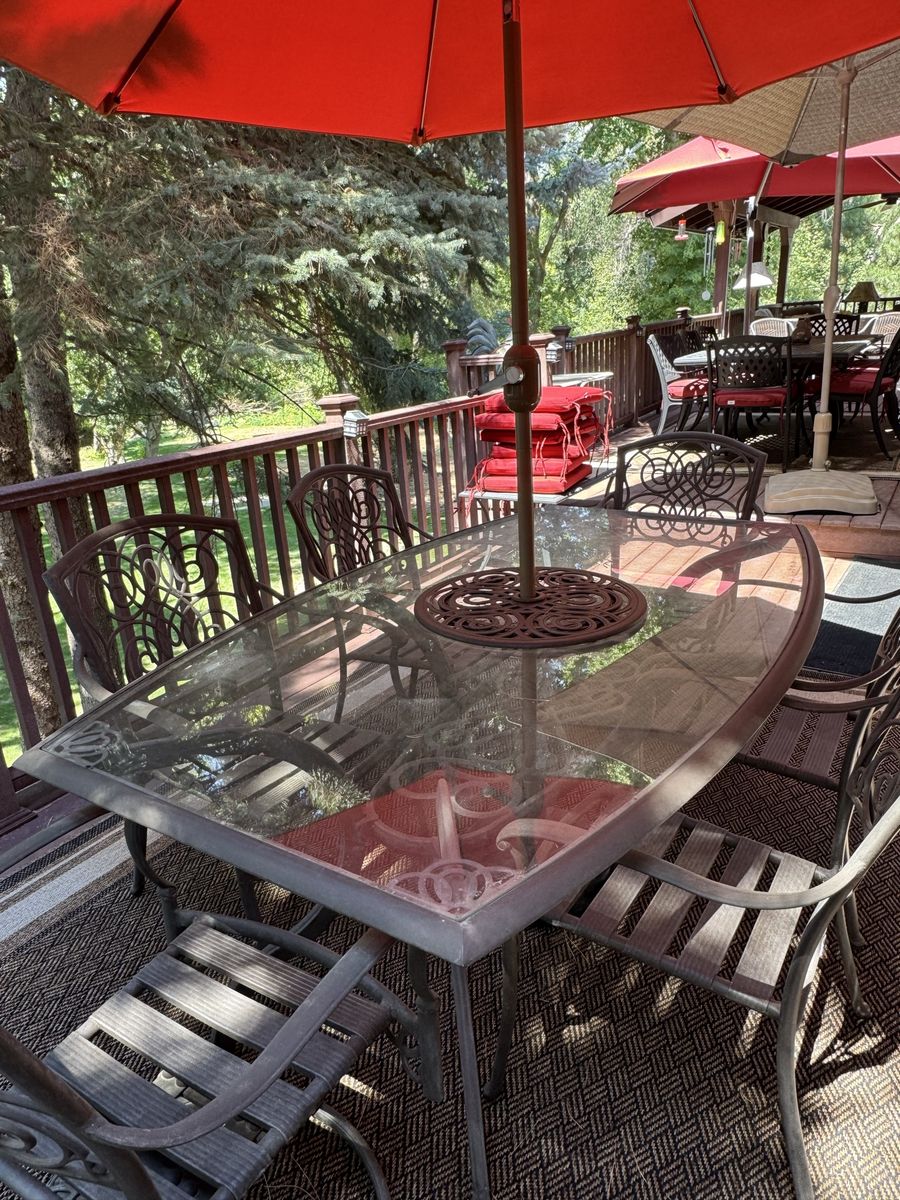 Outdoor Patio Dining Set with Glass-Top Table, 6 Chairs, and Red Umbrella
