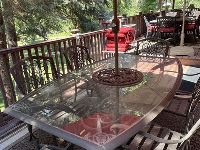Outdoor Patio Dining Set with Glass-Top Table, 6 Chairs, and Red Umbrella