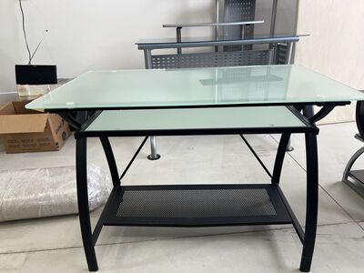 Black metal and glass desk with pull out keyboard shelf