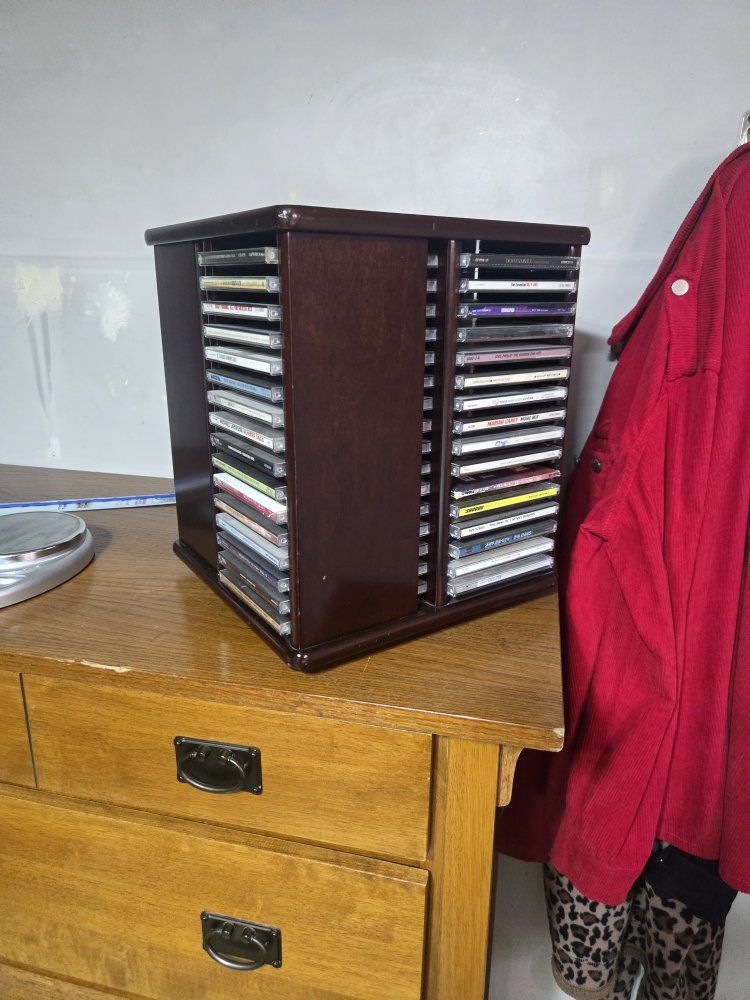 Rotating Wooden CD Storage Rack Carousel Tower not for sale just the cds