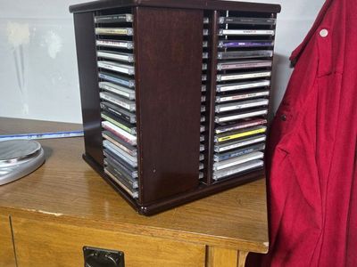 Rotating Wooden CD Storage Rack Carousel Tower not for sale just the cds