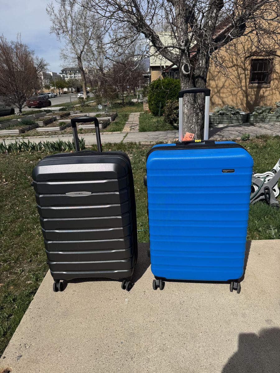 2 beautiful hard shell XL Luggages