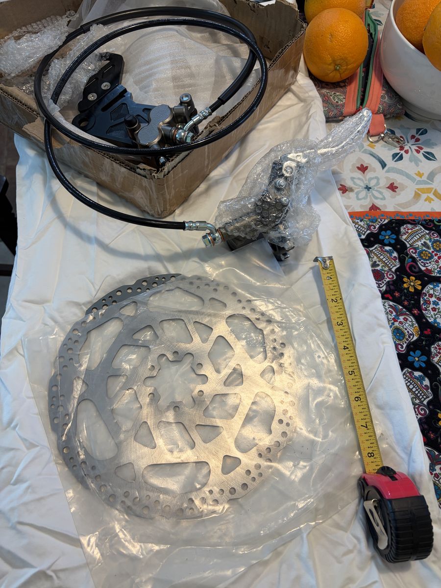 Motorcycle or scooter brake disc assembly.   SLC area only