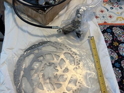 Motorcycle or scooter brake disc assembly. SLC area only