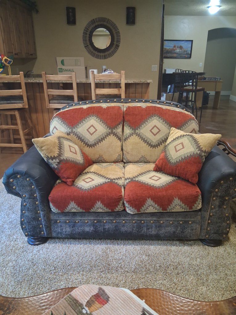 Southwestern Loveseat - Distressed Leather Look with Patterned Fabric Cushions & Stud Accents