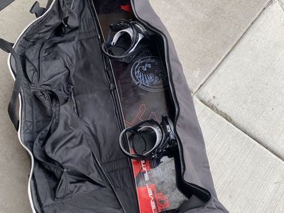 Never Summer Titan Snowboard / Bindings / Boots / Travel Bag