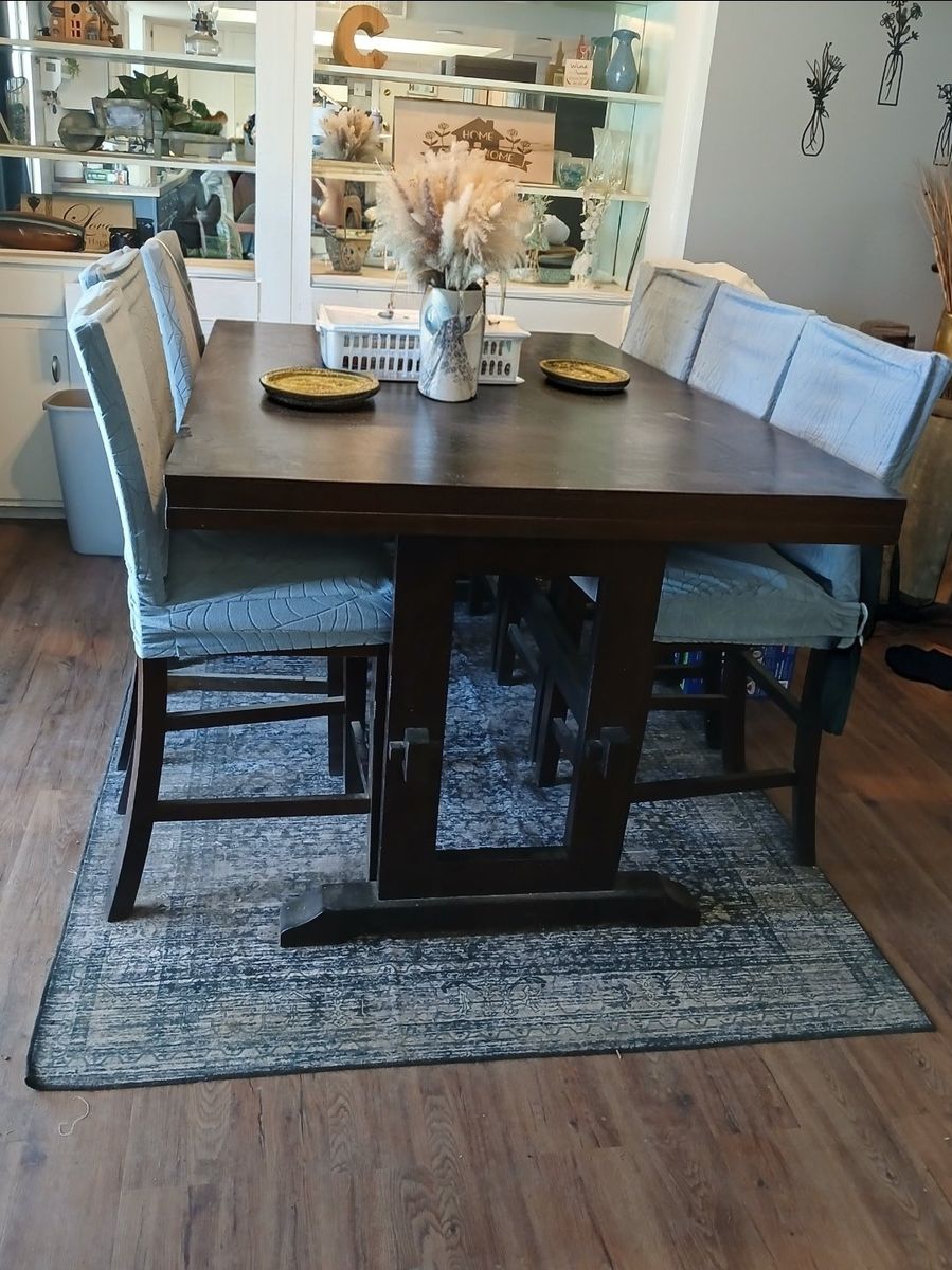 Counter height dining table with 6 padded chairs
