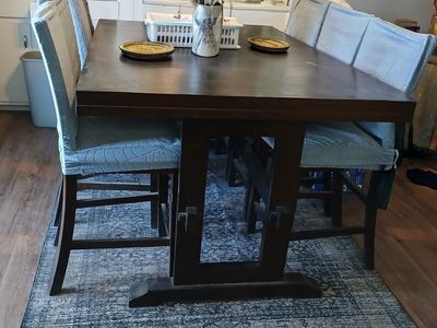 Counter height dining table with 6 padded chairs