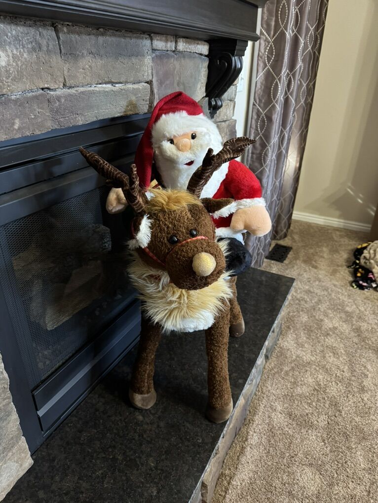 Adorable Santa On His Reindeer Figures