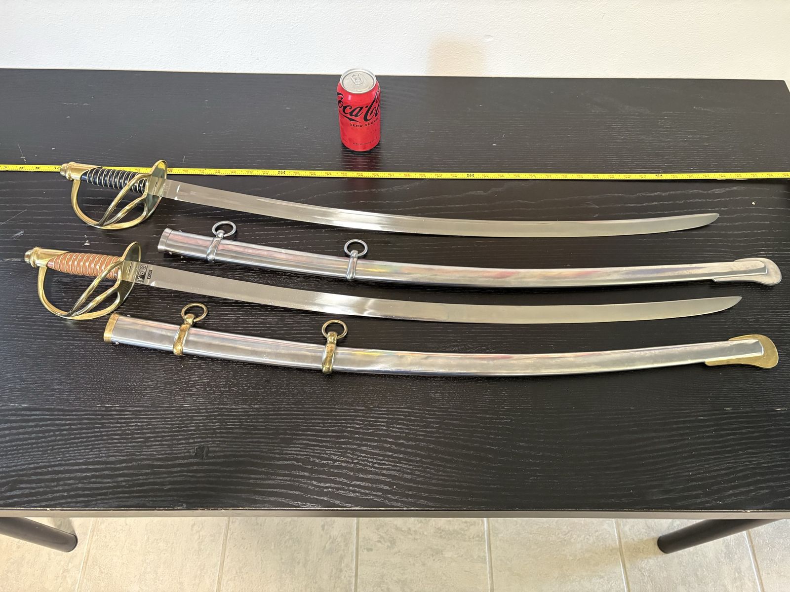Collection of 15 swords and knives