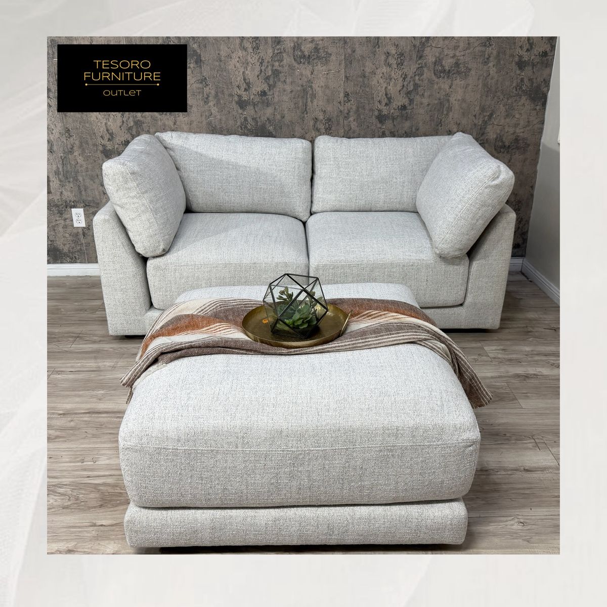 BUCCLE SOFA AND OTTOMAN