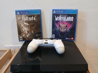 Sony PlayStation 4 (PS4) Console with White Controller power cord, HDMI cable & 2 Games (Fallout 4, Tiny Tina's Wonderlands)