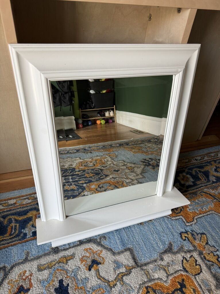 Mirror with shelf