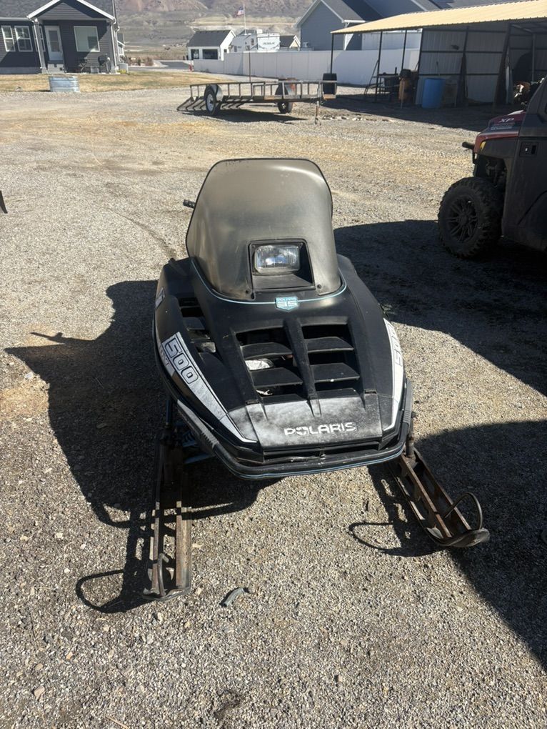 2 Polaris Indy 500 Snowmobiles