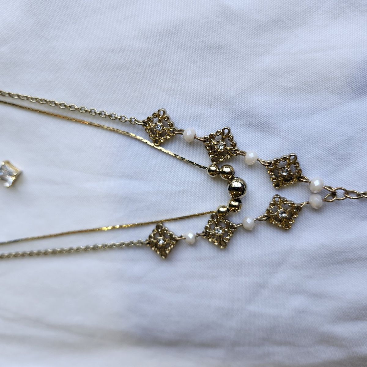 Vintage necklace stack. Layers of four