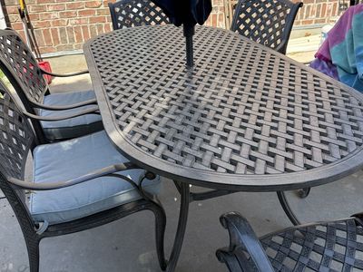 High End Cast Aluminum Patio Dining Set with 6 Chairs, Cushions included.